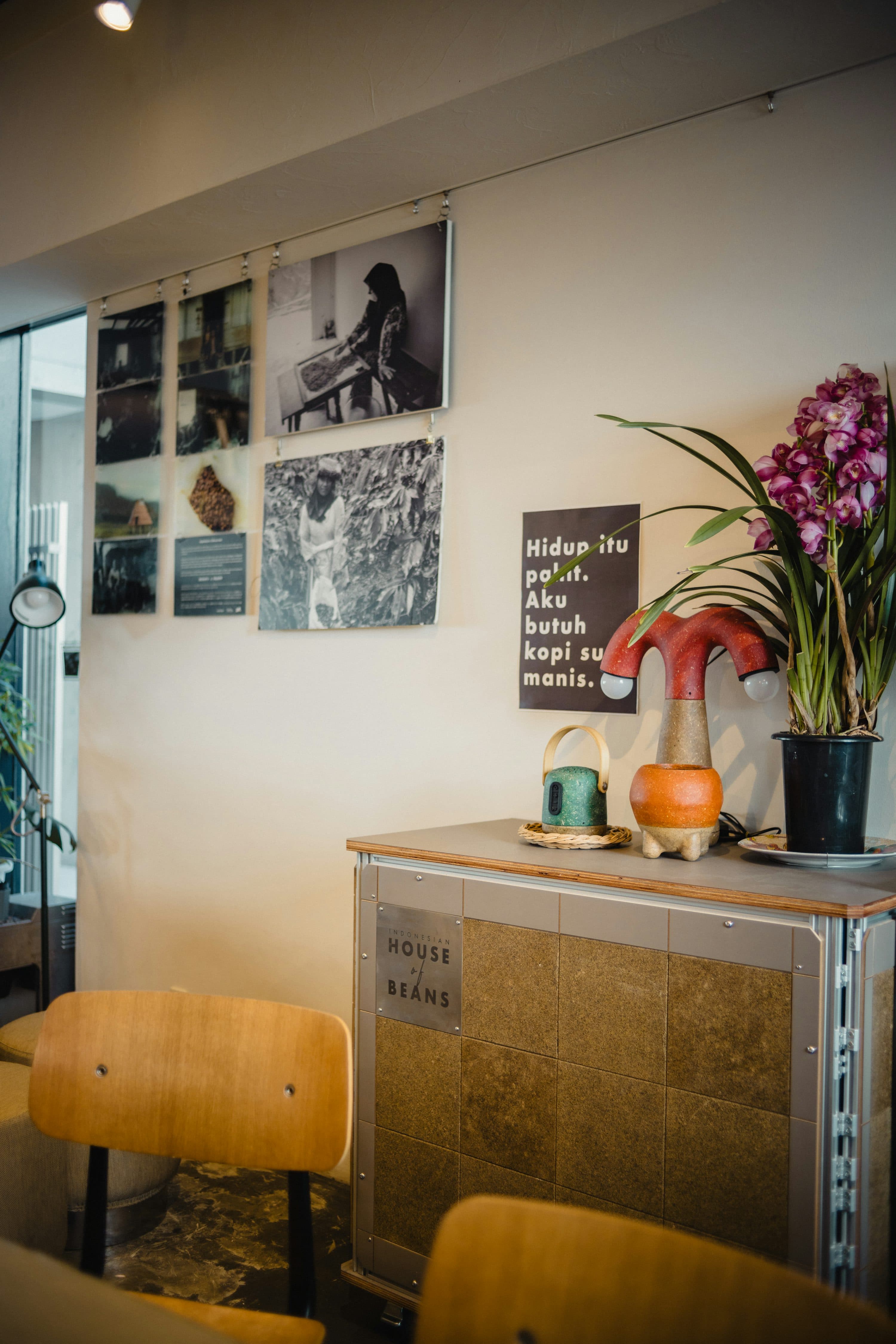 Cafe interior with artwork and plants